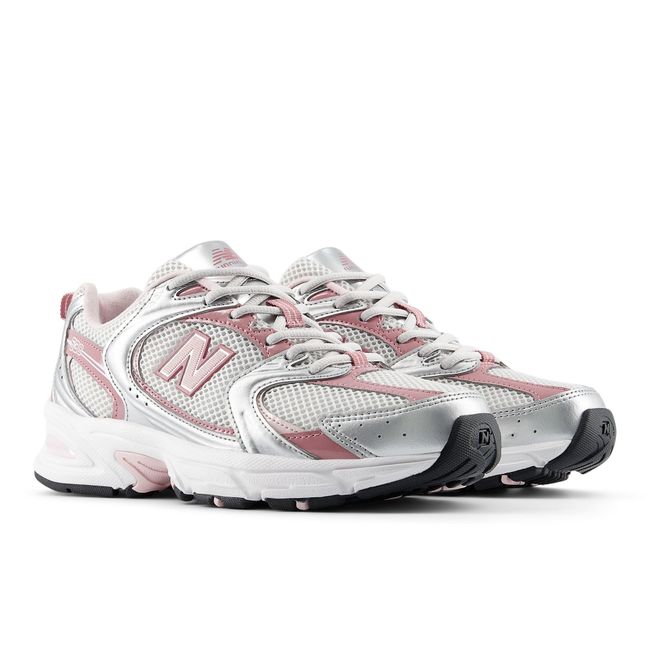 New Balance 530 sneakers in silver metallic, top-down pair view.