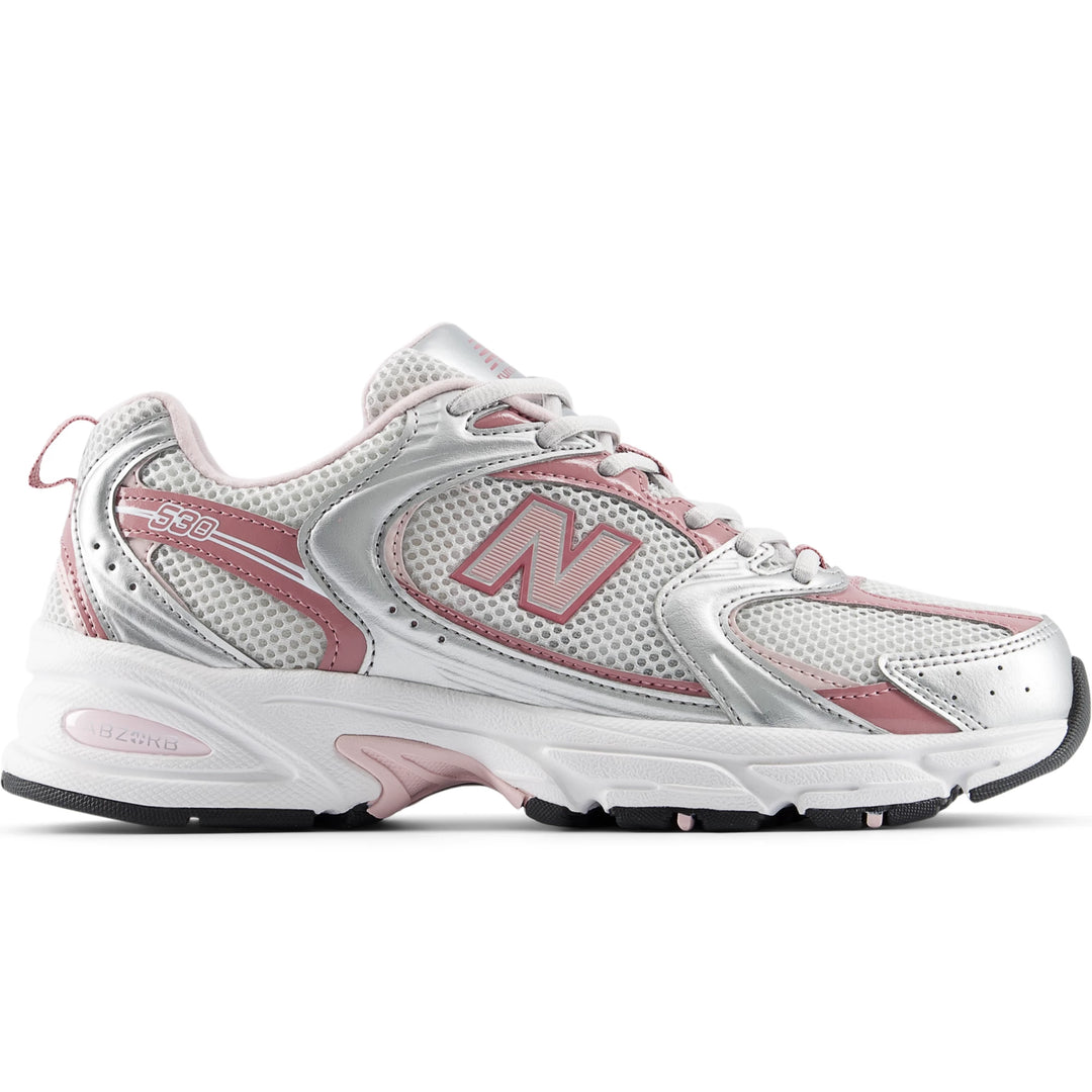 Side of New Balance Unisex 530 sneaker in Silver Metallic