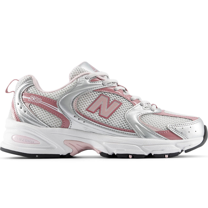 Side of New Balance Unisex 530 sneaker in Silver Metallic