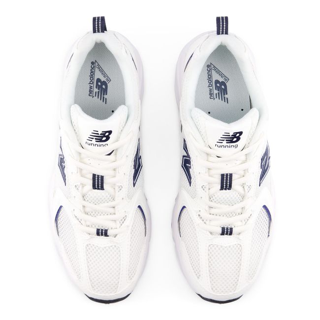 Top down view of the New Balance 530 pair in bright white mesh