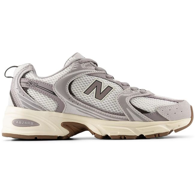 New Balance 530 sneaker in grey with a tan accent, hero view.