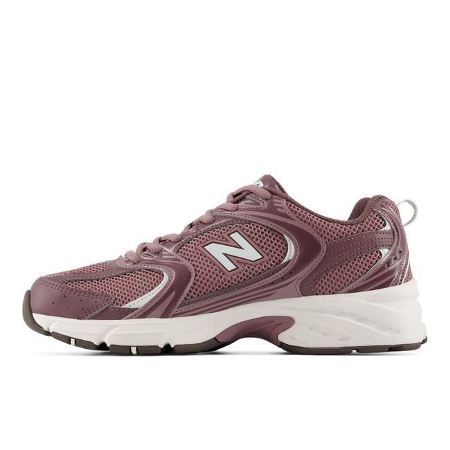 Medial profile of the New Balance 530 in dusty mauve with a white midsole