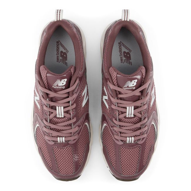 Top down view of the New Balance 530 pair in dusty mauve mesh