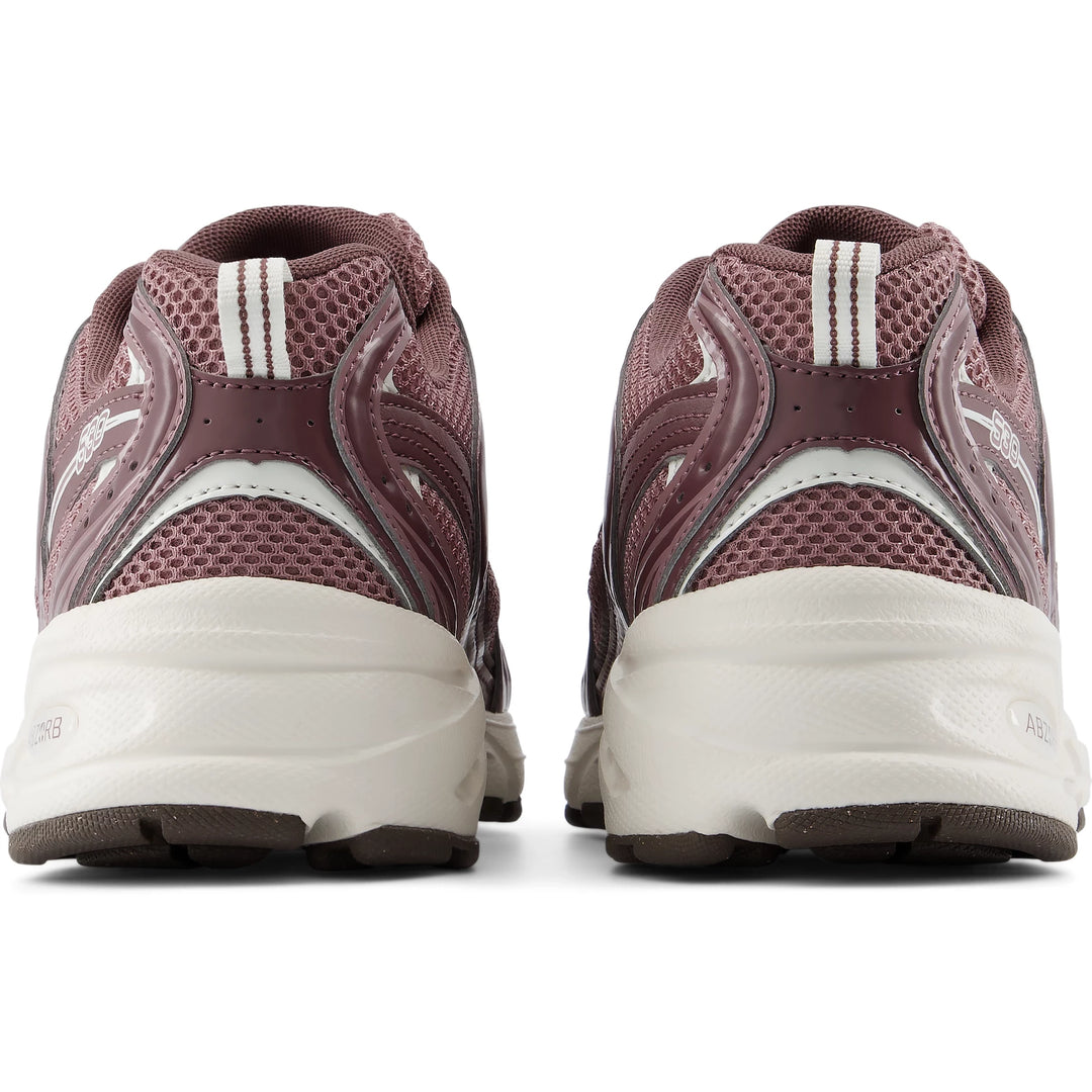 Rear view of New Balance Unisex 530 sneaker in Fast Track/Pebble