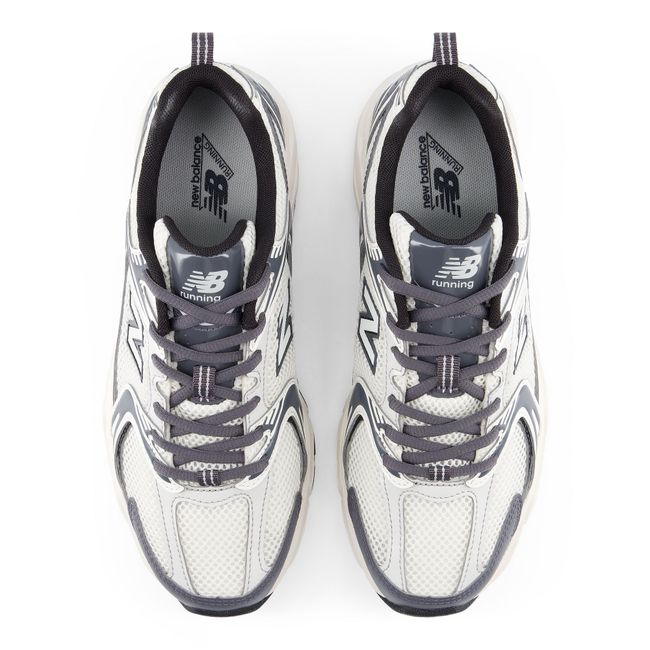 Top down view of the New Balance 530 pair in off-white mesh