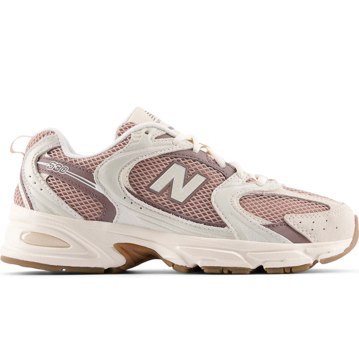 Side of New Balance Unisex 530 sneaker in Bisque/Earth Shadow