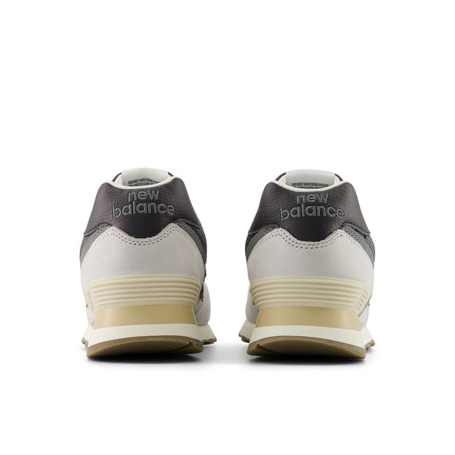 New Balance 574 Lifestyle shoe in grey matter and dark silver metallic, heel view.