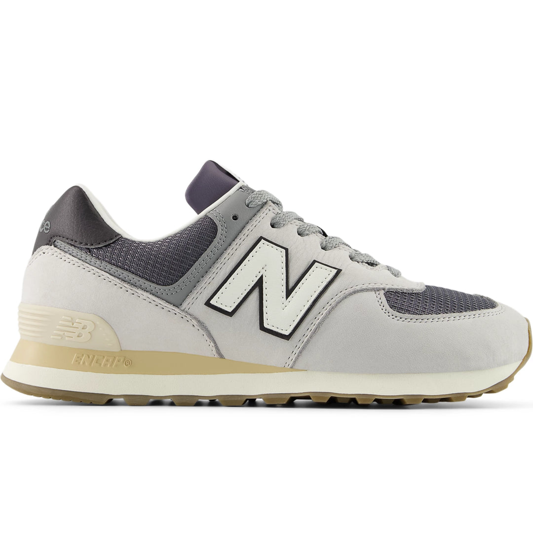 Side of New Balance Unisex 574 sneaker in Grey Matter/Dark Silver Metallic