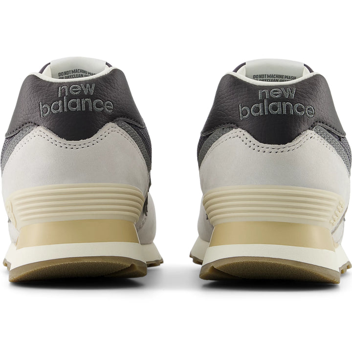 Rear view of New Balance Unisex 574 sneaker in Grey Matter/Dark Silver Metallic