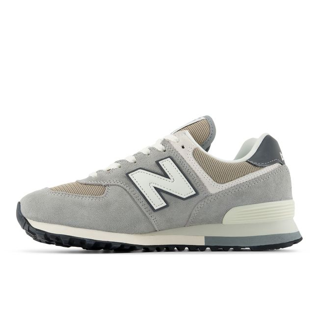 Medial profile of the New Balance 574 in grey suede with stone mesh