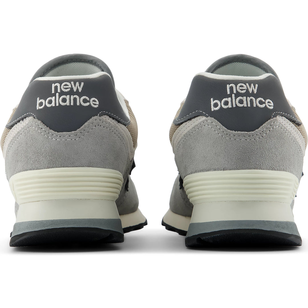 Rear view of New Balance Unisex 574 sneaker in Castlerock/Stoneware