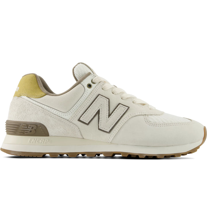 Side of New Balance Unisex 574 sneaker in Dark Arctic Grey