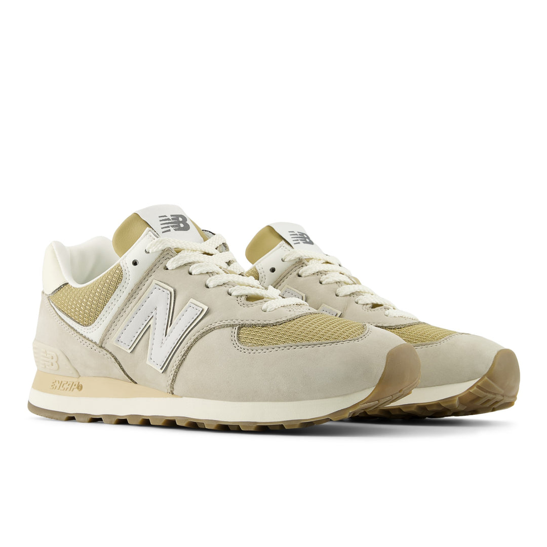 New Balance 574 Lifestyle Shoe in Shipyard/Dark Silver Metallic, three-quarter front view