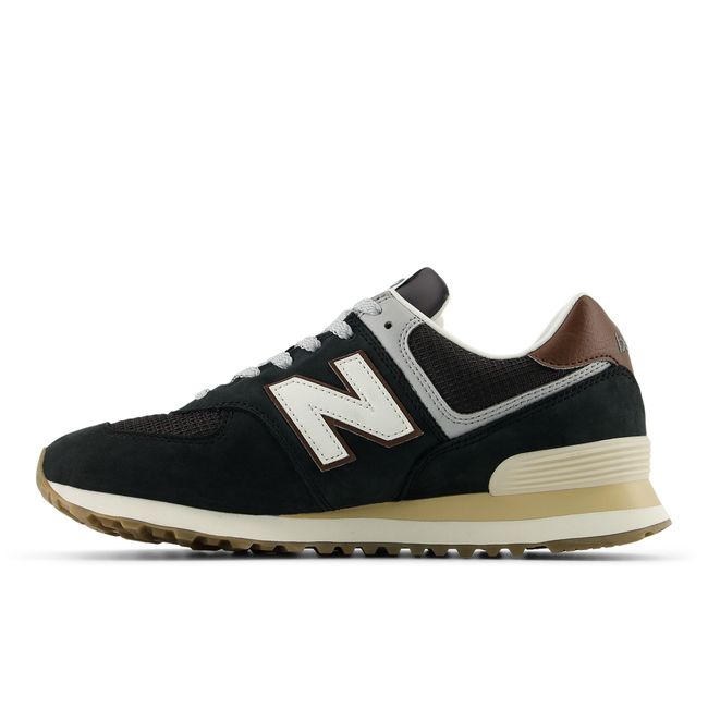 Medial profile of the New Balance 574 in deep brown suede and mesh