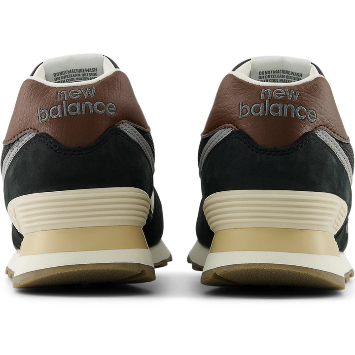 Rear view of New Balance Unisex 574 sneaker in Brown/Dark Silver Metallic