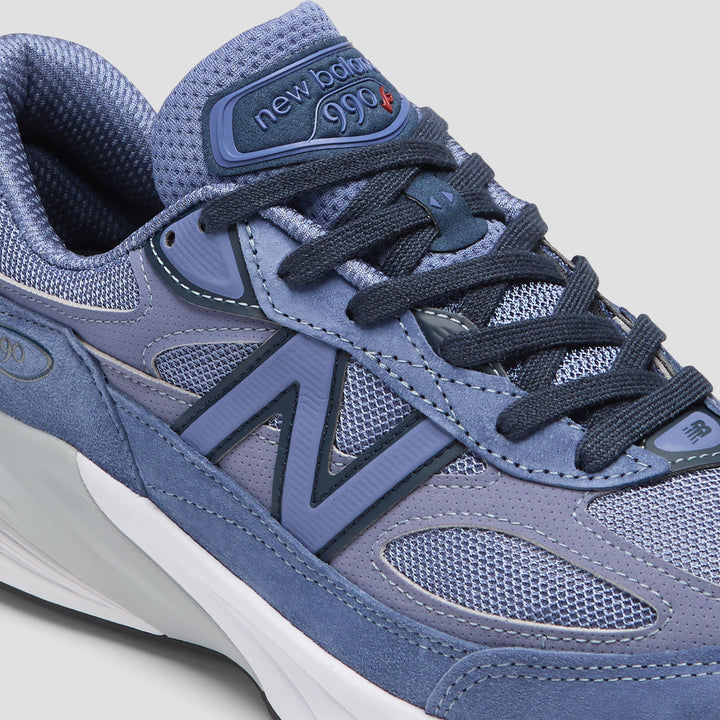 Close-up of New Balance Unisex 990v6 sneaker in Purple/Navy