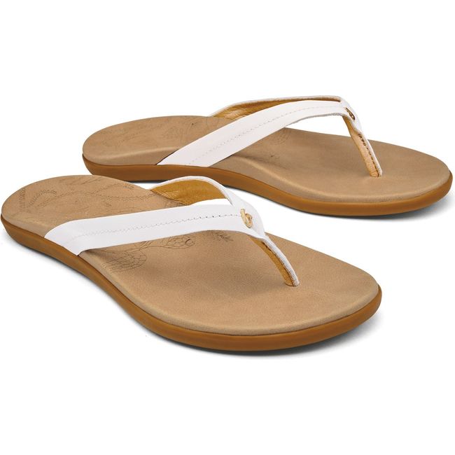 Pair of Women's Olukai Honu Flip Flops in Bright White and Golden Sand tan