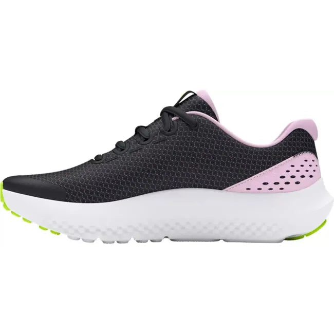 Medial side of Kids Under Armour Surge 4 Running Shoes in black mesh. Purple and white sole