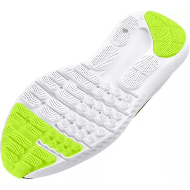 Sole of Kids Under Armour Surge 4 Running Shoes in white with green tread accents