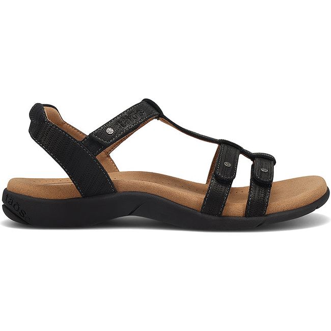 Lateral side of Women's Taos Trophy 2 Sandal in Champagne bronze leather with velcro straps