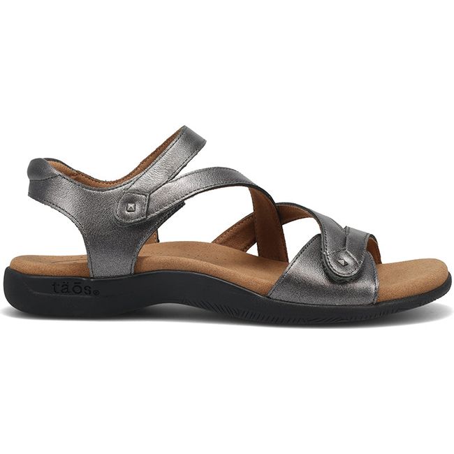 Lateral side of Women's Taos Big Time Sandal in Pewter grey leather with velcro straps