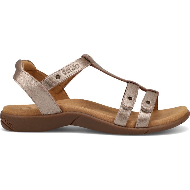 Lateral side of Women's Taos Trophy 2 Sandal in Champagne bronze leather with velcro straps