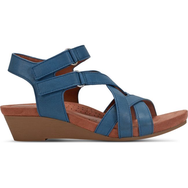 Lateral side of Women's Cobb Hill Helin Wedge Sandal in Medium Blue leather with two velcro straps