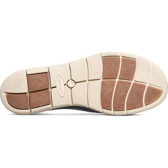 Sole of Womens Cobb Hill Lenoir Slip On Shoe in Black leather upper iwth white outsole and tan tread