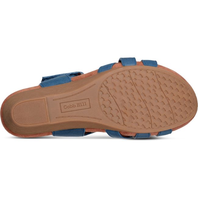Sole of Women's Cobb Hill Helin Wedge Sandal in Medium Blue leather upper with tan sole
