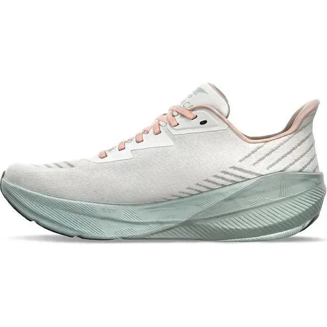 Medial side of Altra Women’s AltraFWD Experience Running Shoe in White with teal sole