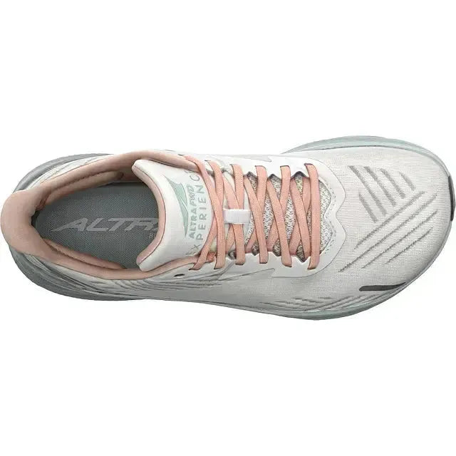Pink lace upper of Altra Women’s AltraFWD Experience Running Shoe in White with teal sole