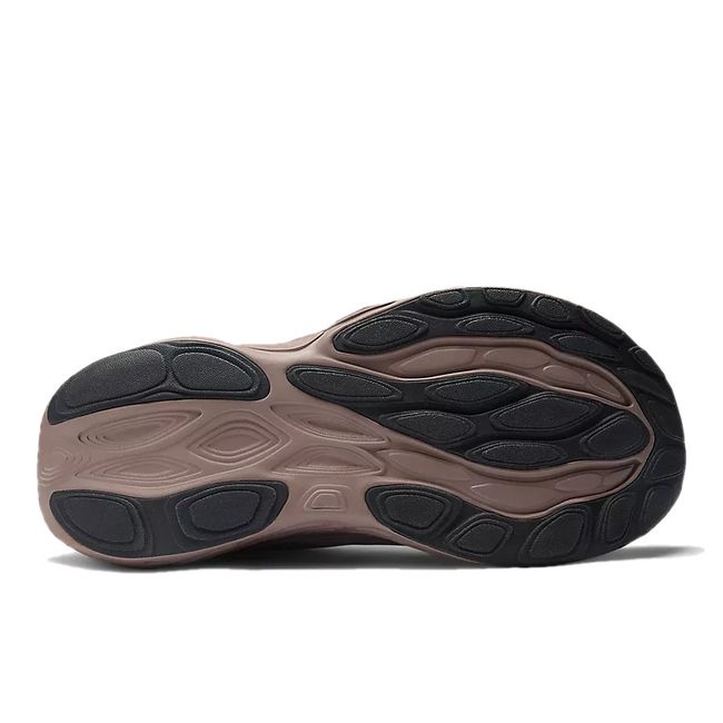 Sole of New Balance Women&#39;s 1080 V14 Running Shoe in earth shadow 