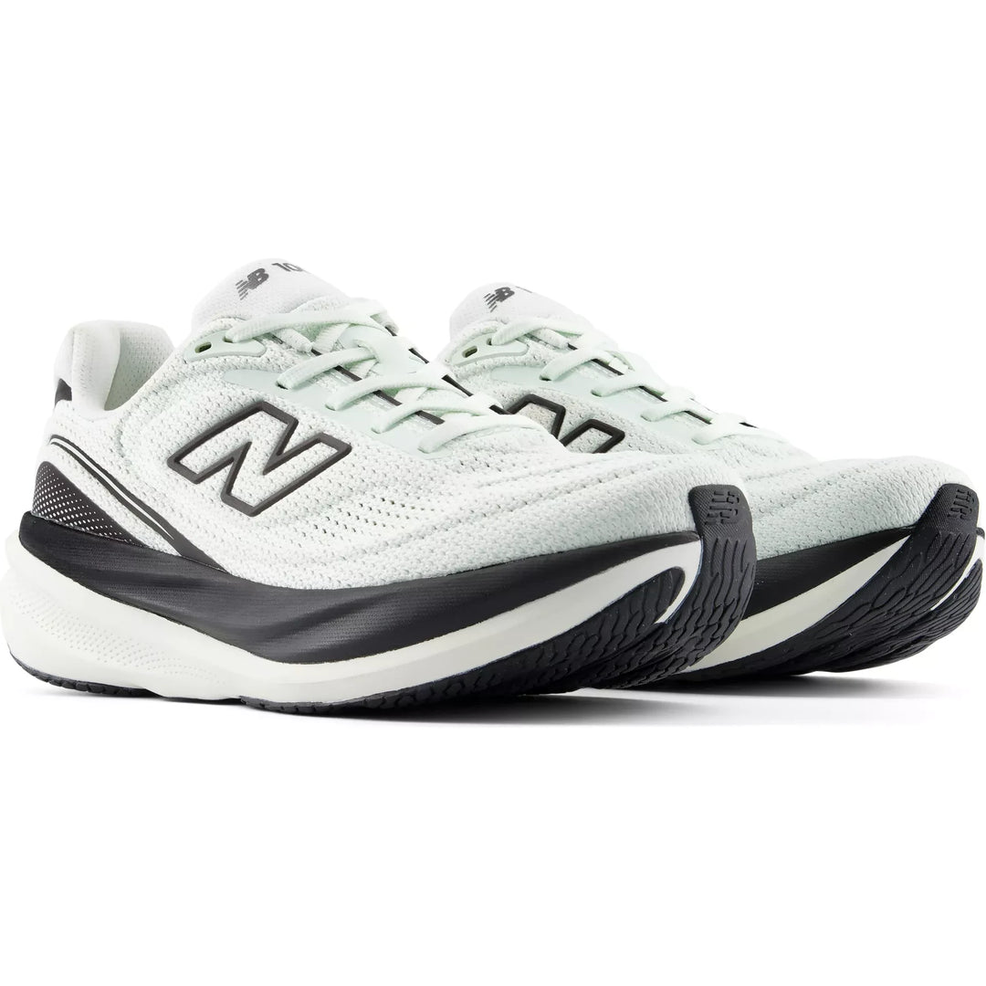 Pair of New Balance 1080v15 running shoes in pale mint white and black