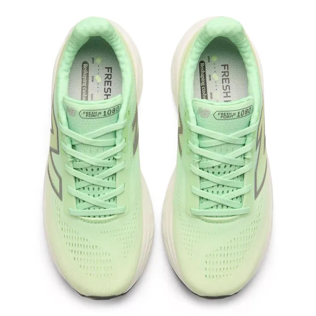 Top view of green New Balance women's running shoe with neon green laces