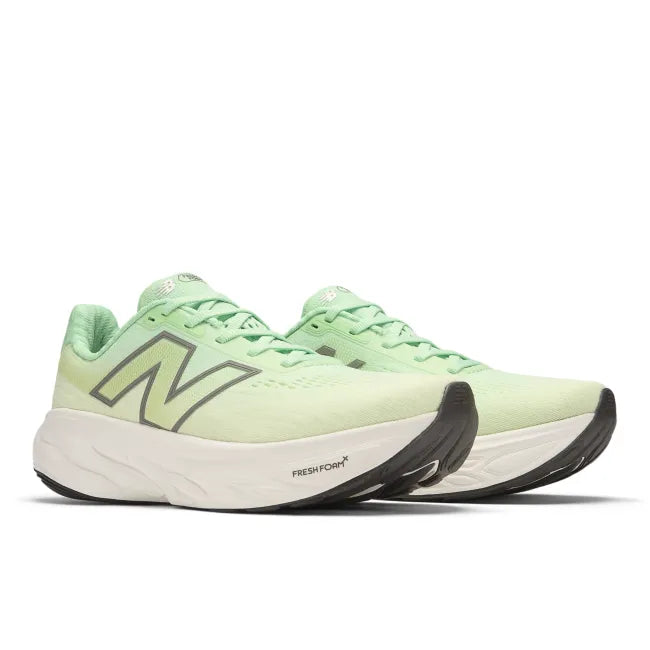 Angled front view of the green New Balance 1080 V14 women's running shoe showing toe and side logo