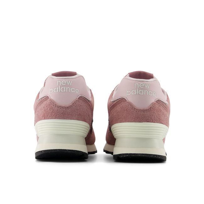 Rear heel view of the New Balance 574 pair in dusty rose and pale pink