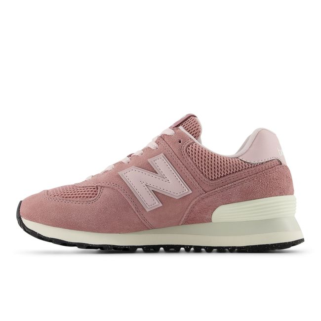 Medial profile of the New Balance 574 in dusty rose suede and mesh