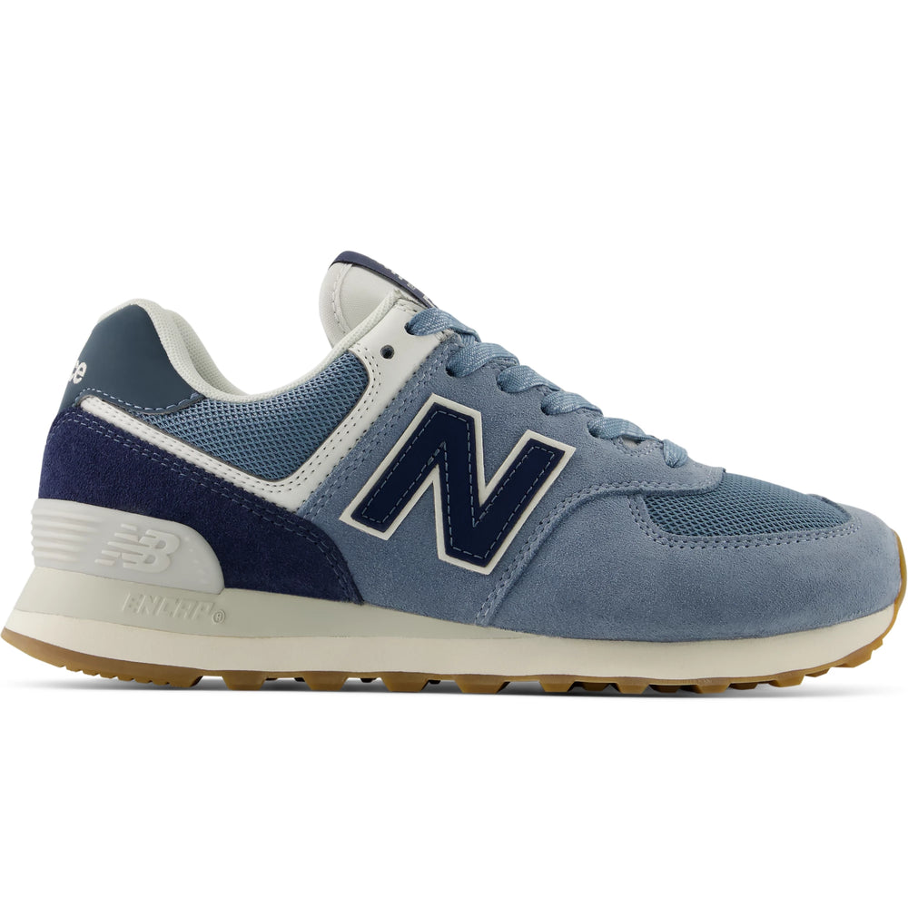 Side of New Balance Women's 574 sneaker in NB Navy/Light Arctic Grey