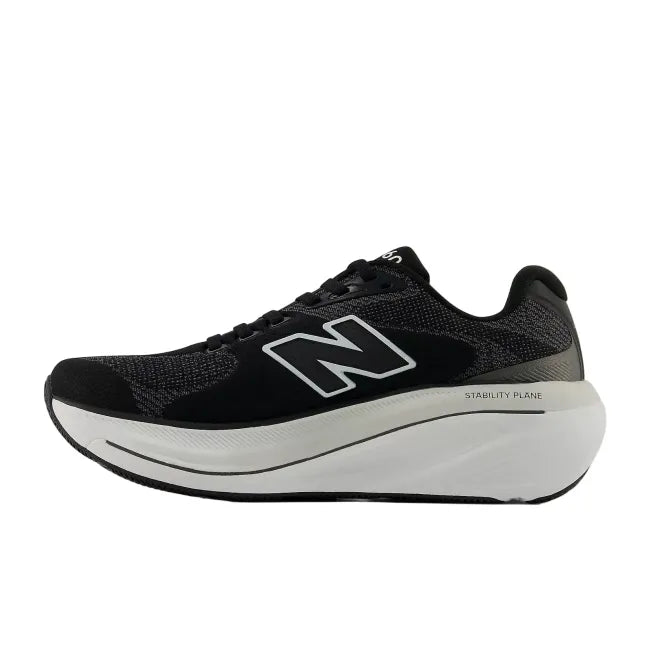 Side profile of New Balance 860 V15 women's running shoe in black showing rocker profile and cushioned midsole