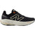 Lateral side of New Balance Fresh Foam X 860v14 sneakers in black with orange accents.