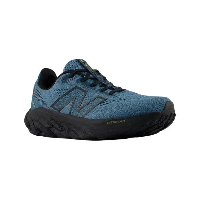 Front of Womens New Balance Fresh Foam X 880v14 Gore-Tex Running Shoe. Deep sea blue with black sole