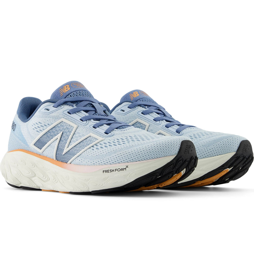 Pair of New Balance Women's Fresh Foam X 880 v14 Running Shoes in Quarry Blue/Sea Salt/Heron Blue