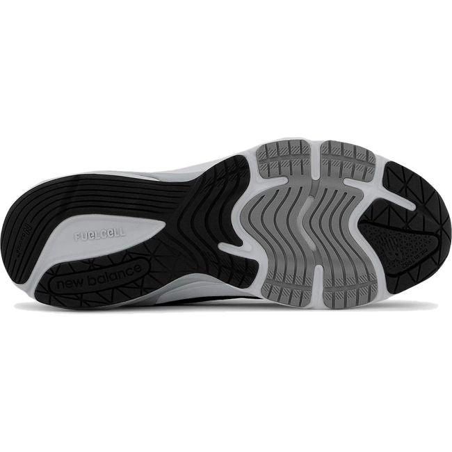 Sole of Women's New Balance 990v6 Running Shoes in navy upper white sole and black and gray tread