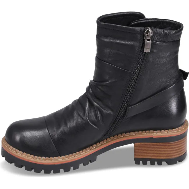 Medial side of Women's Biza Wanda Boot in black leather with tan midsole and side zipper