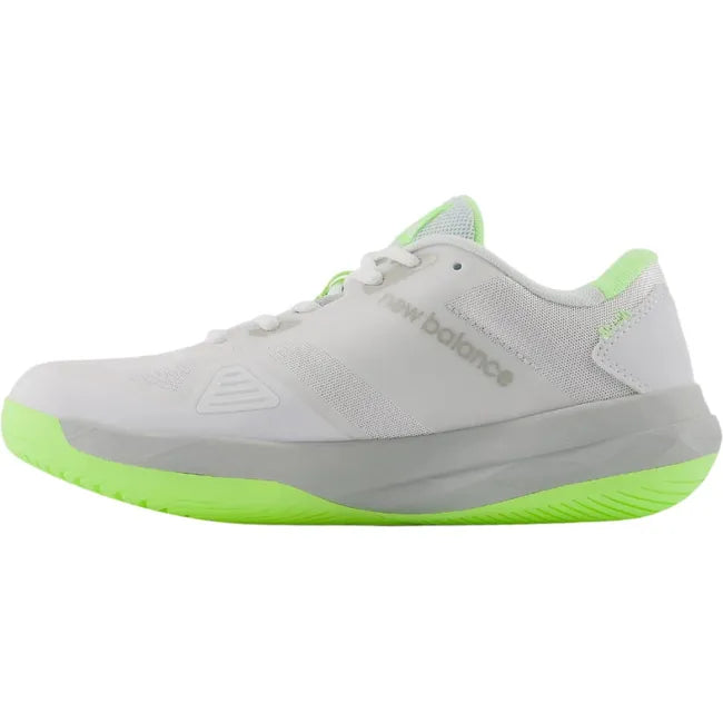 Medial side of women's FuelCell 769v4 New Balance Tennis Shoe in gray with neon green accents