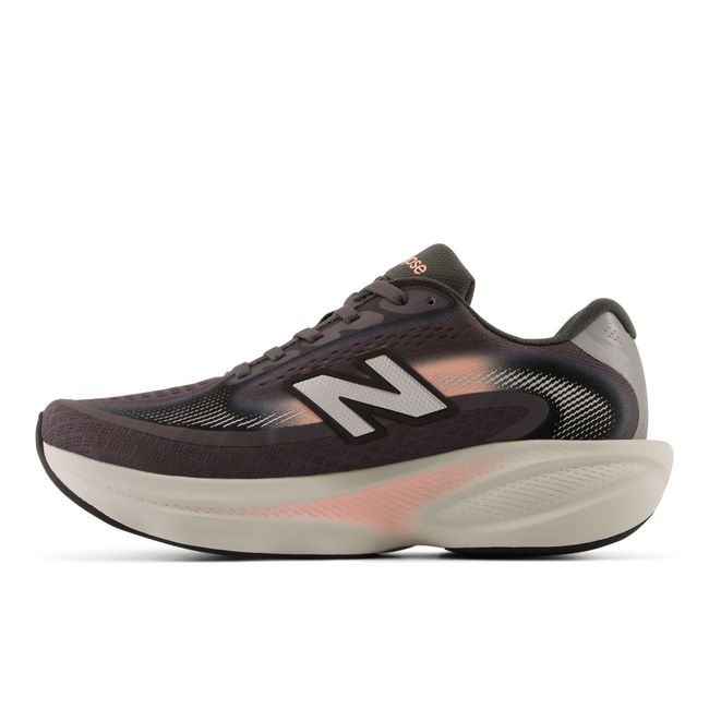 Medial profile of the New Balance Ellipse in dark magnet grey with a cream midsole