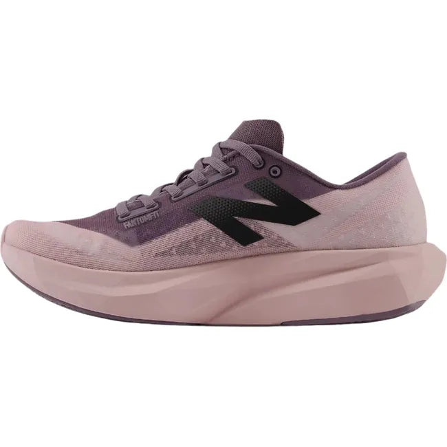 Medial side of New Balance Women's FuelCell Rebel V4 Running Shoe in twilight haze purple
