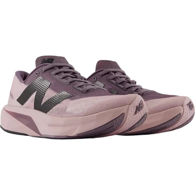 Pair of New Balance Women's FuelCell Rebel V4 Running Shoes in twilight haze purple