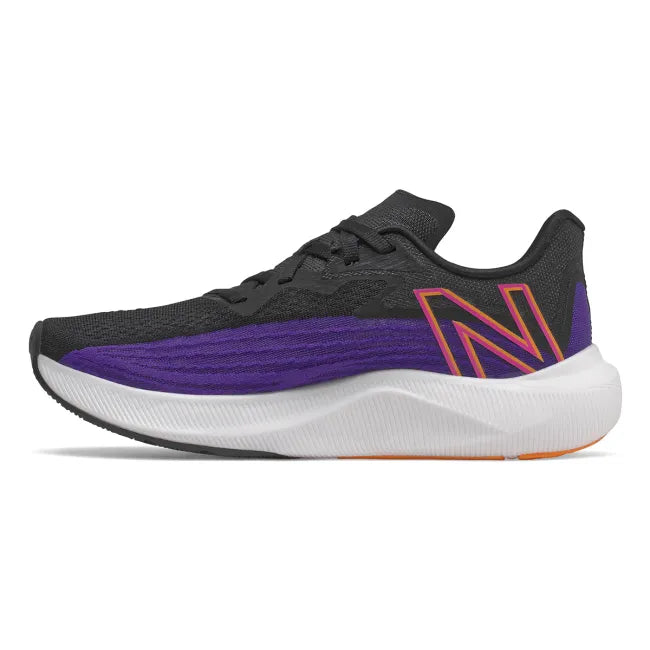Medial side of New Balance Women's FuelCell Rebel V2 Running Shoe in deep violet