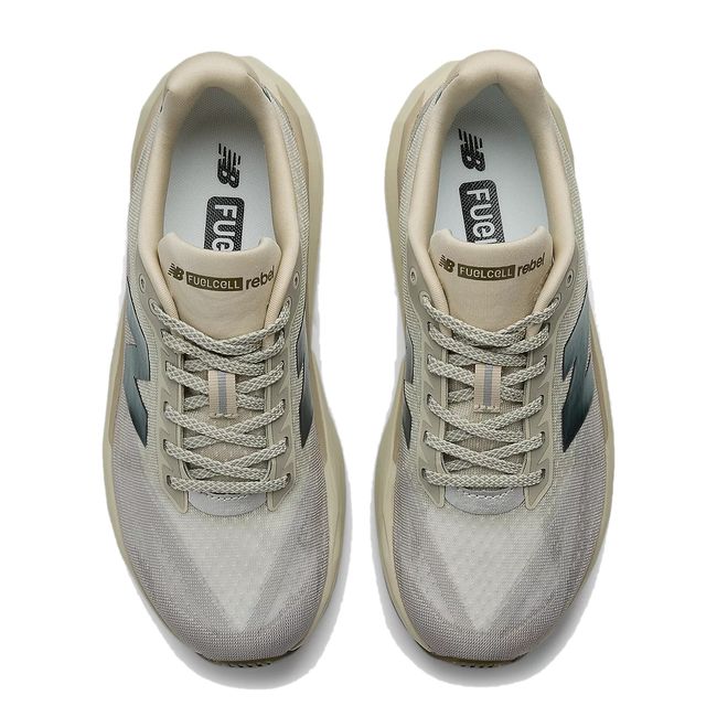 Upper of New Balance Women's FuelCell Rebel V5 Running Shoes in Shipyard/Arid Stone/Woodland beige